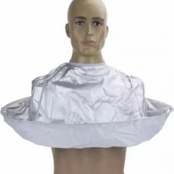 Merkloos Premium Haaropvangende Kappersmantel Zilverkleurig | Kappersschort | Kapmantel Volwassenen | Kapmantel Kind | Vrouw & Man | Kappersset | Kapperscape | Kapper -Babyliss Shop 550x588 2