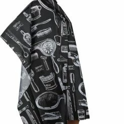 Merkloos Premium Salon Kapmantel - Waterproof Kappersmantel - Kappersschort Waterproof - Duurzaam - Ademend - Kinderen / Volwassenen - Kappers Patronen - Zwart -Babyliss Shop 550x663